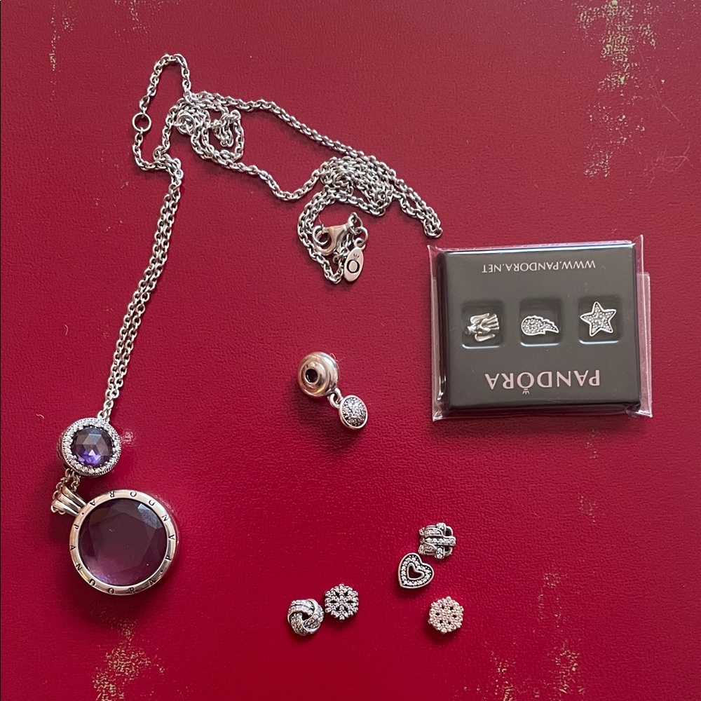 Pandora floating locket with charms and one essence charm